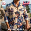 NFL Buffalo Bills Mascot Hawaiian shirt featuring a bearded man in a bucket hat, tropical floral patterns, and team logos.