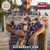 NFL Buffalo Bills Mascot Hawaiian Shirt featuring tropical prints, team logos, and text against a tan and blue backdrop.