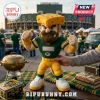 NFL Green Bay Packers Mascot Plush Doll featuring a cheesehead hat, brown beard, and team uniform standing on a table.