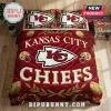 NFL Kansas City Chiefs Quilted 3-Piece Bedding Set featuring red quilted fabric, team logo, helmets, and football motifs.