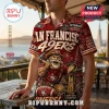 NFL San Francisco 49ers mascot Hawaiian shirt with team graphics, gold trophy, and red background on a man.