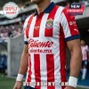 Nike Chivas de Guadalajara 2026 home jersey polo shirt with red and white vertical stripes, navy collar, and team logos.