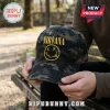 Nirvana Nevermind Smiley Camouflage Baseball Cap with embroidered yellow logo on dark forest green and brown camo fabric.