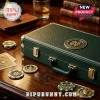 Notre Dame Fighting Irish Premium 300-Piece Poker Set in a green leather case with gold hardware on a wooden table.
