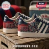 Ole Miss Rebels Adidas Casual Sneakers featuring red, white, and blue colors with custom mascot graphics on wooden crate.