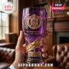 Omega Psi Phi 115th Anniversary purple beer glass with gold embossed crest, lamp, and anniversary text in a hand.