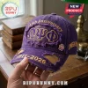 Omega Psi Phi 115th Anniversary purple distressed baseball cap with gold embroidery, 1911-2026 text, and paw print emblem.