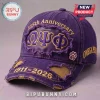 Omega Psi Phi 115th Anniversary Purple Distressed Baseball Cap with gold Greek letters and 1911-2026 stitching.