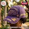 Omega Psi Phi 115th Anniversary Purple Distressed Baseball Cap with gold embroidery, paw emblem, and 1911-2026 text.