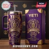 Omega Psi Phi 115th Anniversary YETI Tumbler 40oz featuring purple and gold tie-dye design with official fraternity crest.
