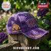 Omega Psi Phi Distressed Purple Baseball Cap featuring a bulldog emblem, fraternity symbols, and customizable name space.