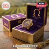 Omega Psi Phi Gold Tone Purple Watch featuring a Greek letter dial inside a custom purple velvet-lined wooden gift box.