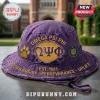 Omega Psi Phi Premium Distressed Purple Bucket Hat featuring gold embroidery, fraternity Greek letters, and a paw print patch.