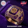 Omega Psi Phi Purple Amethyst Gold Ring featuring gold crest and lettering on a deep purple velvet background.