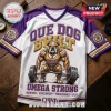 Omega Psi Phi Que Dog Built Weightlifting shirt in white and purple featuring a muscular bulldog lifting a barbell.
