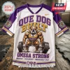 Omega Psi Phi Que Dog Built Weightlifting shirt in white and purple with a muscular bulldog lifting a barbell graphic.