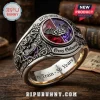 Ozzy Osbourne 1970-2026 engraved ring featuring a split red and purple crystal, bat motifs, and metallic gothic detailing.