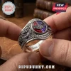Ozzy Osbourne 1970-2026 engraved ring featuring a split red and purple gemstone, metal bat motifs, and gothic silver detailing.