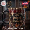 Ozzy Osbourne Prince of Darkness coffee mug with skull and bat motifs, gold lettering, and a matching bat stirring spoon.