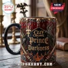Ozzy Osbourne Prince of Darkness coffee mug with skull and bat motifs, gold lettering, and a matching metal bat spoon.