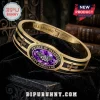 Ozzy Osbourne Prince of Darkness hinged bracelet featuring a purple gemstone, bat emblem, and gold-tone cross motifs.