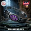 Ozzy Osbourne Prince of Darkness hinged bracelet featuring a central purple gemstone, black enamel, and engraved crosses.