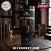 Ozzy Osbourne Prince of Darkness Stanley Tumbler 40oz in matte black with portrait graphic and signature on library desk.