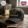 Parliament Funkadelic Distressed Denim Baseball Cap featuring a vintage band graphic and frayed edges on a wooden table.