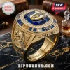 Parramatta Eels 1947 Engraved Gold Ring featuring a large blue gemstone, gold eel emblem, and decorative side carvings.