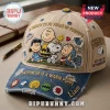 Peanuts 76th Anniversary Embroidered Denim Baseball Cap featuring Snoopy, Charlie Brown, and friends on beige and blue fabric.