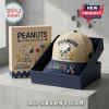 Peanuts Autism Awareness Snoopy Beige Baseball Cap with navy brim, puzzle piece embroidery, and gift box packaging.