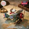 Peanuts Snoopy Flying Ace Christmas Tree Ornament featuring Snoopy in a vintage green biplane on a paper map background.