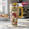 Peanuts Snoopy Mrs Teresa Personalized 40oz Tumbler with yellow handle, featuring classic Peanuts characters on cream base.