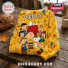 Peanuts Snoopy Yellow Crewneck Ugly Sweater featuring Charlie Brown, Lucy, and Woodstock on a vibrant yellow fabric background.