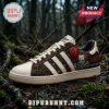 Pennywise It Horror Movie Casual Sneakers featuring clown graphics, red balloons, and cream-colored leather on forest floor.