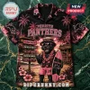 Penrith Panthers NRL mascot Hawaiian shirt featuring a black panther holding a surfboard on a tropical beach at sunset.