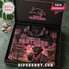 Penrith Panthers NRL Mascot Hawaiian shirt in black with pink palm trees, sunset beach print, and team branding in a box.