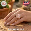Personalized Letter D Rose Gold Heart Butterfly Ring featuring pink stones and floral engravings on a woman's finger.