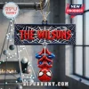 Personalized Spider-Man Web Acrylic Ornament hanging from a pipe with red text reading The Wilsons against a web design.