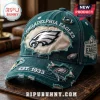 Philadelphia Eagles Distressed Green Embroidered Baseball Cap with raw edges, team logos, and text Est. 1933 on dark table.