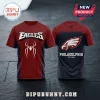 Philadelphia Eagles x Spider-Man shirt featuring red web patterns, team logo, and back view with Philadelphia branding.
