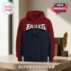 Philadelphia Eagles x Spider-Man hoodie featuring a red and blue web pattern, a black spider icon, and white text logo.