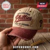 Philadelphia Phillies Field of Dreams 2026 Distressed Baseball Cap in tan and maroon with frayed visor on brick background.
