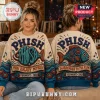 Phish Vermont 1983 Embroidered Ugly Sweater in beige and blue featuring Phish band lettering and fish illustrations.
