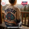 Phish Vermont 1983 Embroidered Ugly Sweater featuring a large blue fish graphic and band text on a tan knit background.