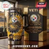 Pittsburgh Steelers 93rd Anniversary Stanley Tumbler with tie-dye yellow and black pattern and team logo on gold box.