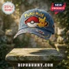Pokemon 30th Anniversary Pikachu distressed blue denim baseball cap with embroidered Poke Ball and 1996 text on stone plinth.