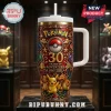 Pokemon 30th Anniversary Stainless Steel Tumbler 40oz featuring embossed gold pokeballs, character graphics, and red finish.