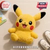 Pokemon Pikachu Soft Plush Toy with bright yellow fur, black ear tips, red cheeks, and a smiling mouth on a wood surface.