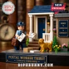 Postal Worker Tribute 612 Piece Building Brick Set featuring a mail carrier, brick-built house, and yellow dog figure.